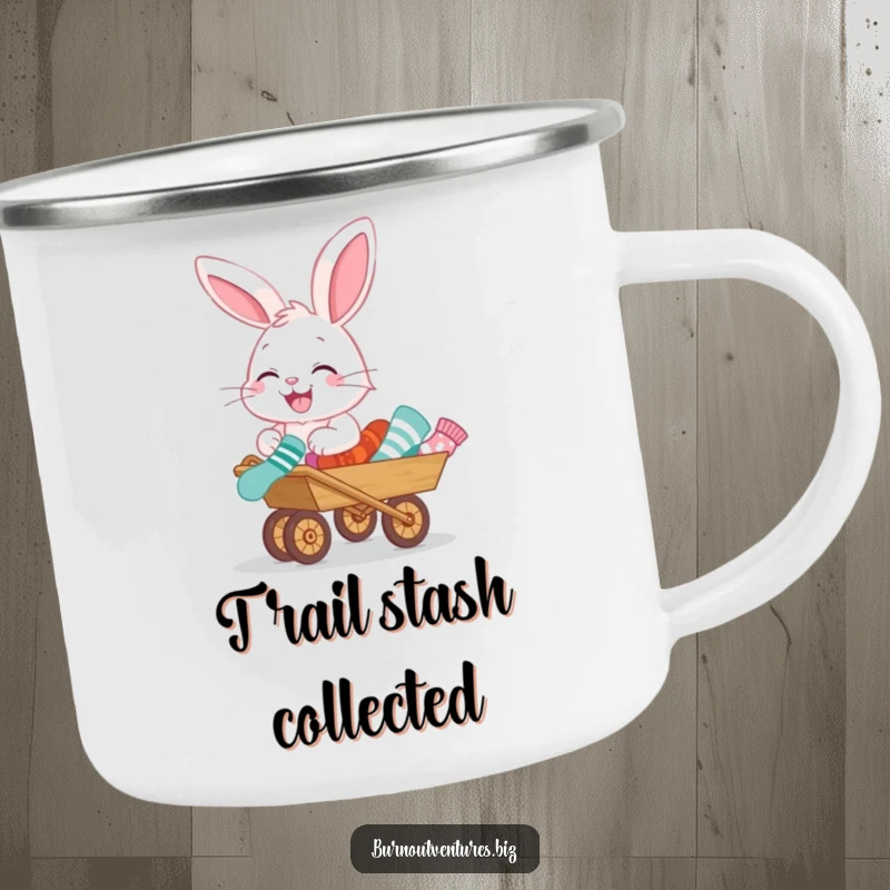 Funny camping mug showing a giggling bunny pushing a tiny wheelbarrow filled with mismatched socks, great for outdoor humor.