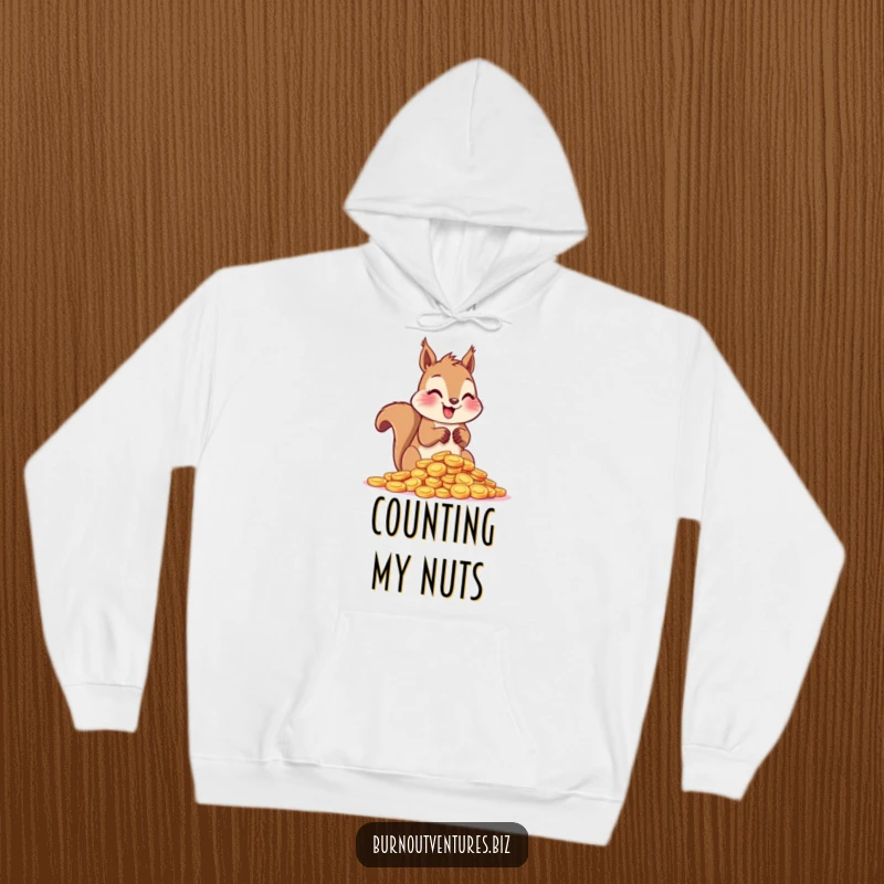 Funny squirrel enthusiastically counting shiny tokens with its paws, featured on a warm hoodie for collectors.